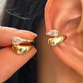 Elegant gold twisted ear cuff featuring a pear-shaped zircon for non-pierced ears - 1 Pair (Left and Right) / Gold
