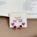 Set of 3 pairs of pink bow and heart stud earrings featuring a sweet and cool aesthetic style. - Lace Butterfly Pink Black (BBF5)