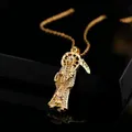 Detailed macro view of a gold-plated Santa Muerte pendant with micro-set zircons - Santa Muerte Micro Pave Style (P04925)
