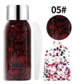 Gros plan professionnel sur un gel pailleté rouge et noir pour corps avec applicateur - N°05 / Spécification Normale