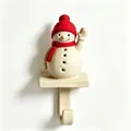 Close-up of a festive snowman Christmas stocking hook featuring a red knitted hat - Style B / 1 Piece / Christmas Snowman Hook-White Hat