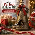 Detailed view of bell-shaped Christmas bird feeder with festive holiday decorations. - Bell