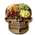 Unique skull-shaped wooden Halloween charcuterie board platter with fruit assortment - Skull Alien
