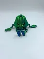 Bewegliches 3D-gedrucktes Kürbis-Monster-Spielzeug in Seidengrün und Blau für Halloween - Kürbis Böse / Blaugrün