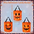 Detail view of 3Pcs Halloween glowing candy baskets showing dimensions and pumpkin faces - 3-Piece Set A