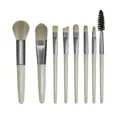 Vista dettagliata di un set di 8 pennelli trucco professionali per viso e occhi - Set da 8 pezzi / verde chiaro