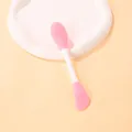 Double-ended silicone face mask brush tool with pink cleaning head and soft spatula - Light Pink Blade Head