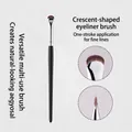 Professional crescent-shaped eyeliner brush for precise eye makeup and aegyo-sal. - Black