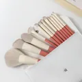 Set professionale di 12 pennelli da trucco morbidi con manici corallo e custodia bianca - Serie Vacanze Con Pochette Bianca
