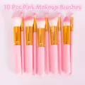 Set of 10 professional pink makeup brushes with soft fiber bristles and gold ferrule details - 10-Piece Set / Pink