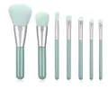 Complete 7-piece mint green makeup brush set with soft bristles and stylish teal handles - 7 Pcs Set / Cyan
