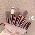 Set di 13 pennelli per trucco professionali con setole marroni e pochette - Marrone