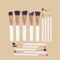 Set di 14 pennelli per trucco professionale con manici bianchi e ghiere in oro rosa. - 14 Pezzi/Confezione / Oro bianco