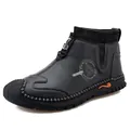 Casual men's leather slip-on shoes featuring hand-stitched details and ribbed collar in black - 38 / Black