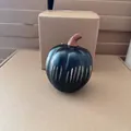 Detailed view of a black glass pumpkin with starry night metallic silver pattern - L / Black