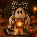 Macro shot of a rustic wooden ghost decoration holding a glowing star for Halloween - Ghost Style B (Bowknot)