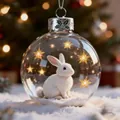 Christmas crystal glass ball ornament featuring a white rabbit and glowing stars - Rabbit
