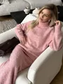 Model wears pink wool blend knit two-piece set featuring a fuzzy turtleneck sweater - M / Top And Bottom / Pink
