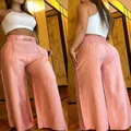 Pantalon évasé élégant à taille haute pêche présenté en vue divisée de face et de dos - Rose / S