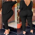 Back and side view of a black seamless 2-piece high-stretch yoga set for women. - S / Top And Bottom / Black
