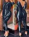 Two-piece women's yoga set featuring a printed top with back twist and matching leggings. - 3XL / Top And Bottom / Navy Blue Print