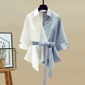 Elegant blue and white color-block asymmetric wrap shirt featuring a chic waist tie detail - 3XL / Tops
