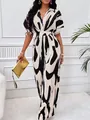 Elegant V-neck jumpsuit with abstract black and white print and wide-leg trousers - S / Set / Black and White