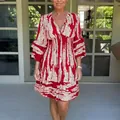 Full view of women's red V-neck printed summer dress with cinched waist and ruffled sleeves - S / Dresses / Red