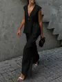 Chic urban street style featuring a black sleeveless vest and matching wide-leg trousers. - S / Top And Bottom (K25003) / Black