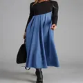 Detailed view of women's autumn color-block long-sleeved midi dress with irregular hemline - S / Light Blue
