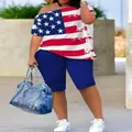 Detailed view of women's off-shoulder US flag print T-shirt and matching blue shorts set - S / Top And Bottom / Stars and Stripes