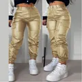 Close-up detail of women's metallic gold PU cargo pants with stylish side pockets - S / Yellow