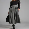 Full view of the color-block pleated long-sleeve dress showing the asymmetric waist. - S / Gray