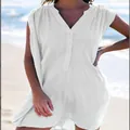 Close-up detail of a white V-neck sleeveless button dress with crinkle fabric - S / Dresses / White