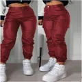 High-waisted burgundy PU leather cargo pants with pockets and elastic cuffs - Burgundy