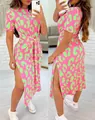 Detailed view of neon pink leopard print dress with side slit and waist tie detail. - Pink