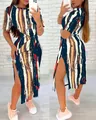 Detailed view of women's short sleeve split dress with abstract print and waist tie - White Blue Striped