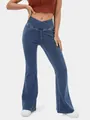 Detalle de los pantalones de yoga acampanados de cintura alta con diseño cruzado - S / Bottoms / Azul Denim