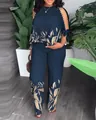 Navy blue two-piece set with leaf print and beaded shoulder details shown on model - L / Top And Bottom / Dark Blue