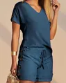 Stylish summer two-piece outfit featuring a blue V-neck top and shorts with button details - S / Blue