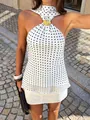 Close-up detail of a white polka dot halter neck top featuring a stylish gold ring - S / White