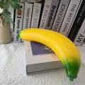 Large realistic simulation banana squishy toy for stress relief on decorative books. - Banana Style / Jumbo Flour Filled Version