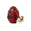 Red textured Halloween spider egg toy with miniature white spider ornament - Brown
