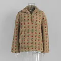 Detailed view of a floral pattern sherpa fleece pullover sweatshirt on a mannequin - S / Tops / Khaki Floral