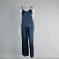 Dark blue satin two-piece pajama set with camisole top and long pants on mannequin. - S / Top And Bottom / Navy Blue