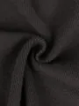 Detalle macro de la textura de punto acanalado oscuro mostrando material de invierno de calidad. - S / Top Y Pantalón / Set de dos piezas / Marrón Oscuro