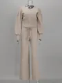 Vista frontal del conjunto de punto beige con top con cremallera y pantalones anchos. - S / Top Y Pantalón / Albaricoque