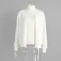 Front view of elegant white knitwear set with turtleneck sleeveless top and cardigan - S / Set / Vest and Cardigan Set / White