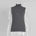 Front view of dark grey sleeveless turtleneck knit vest displayed on a clear mannequin - S / Tops / Vest Only / Dark Gray