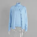Detailed macro view of women's light blue knitwear set with sleeveless top and cardigan - S / Set / Vest and Cardigan Set / Blue